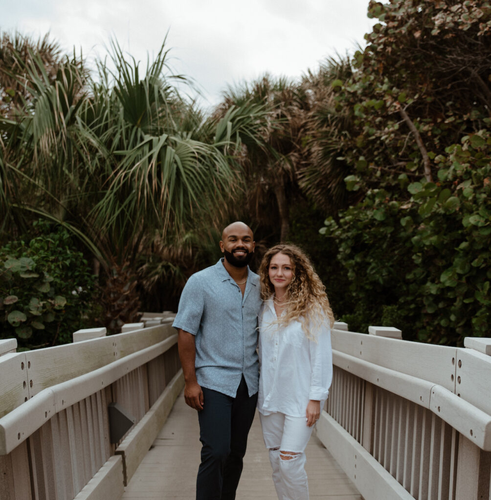 couple poses together outdoors